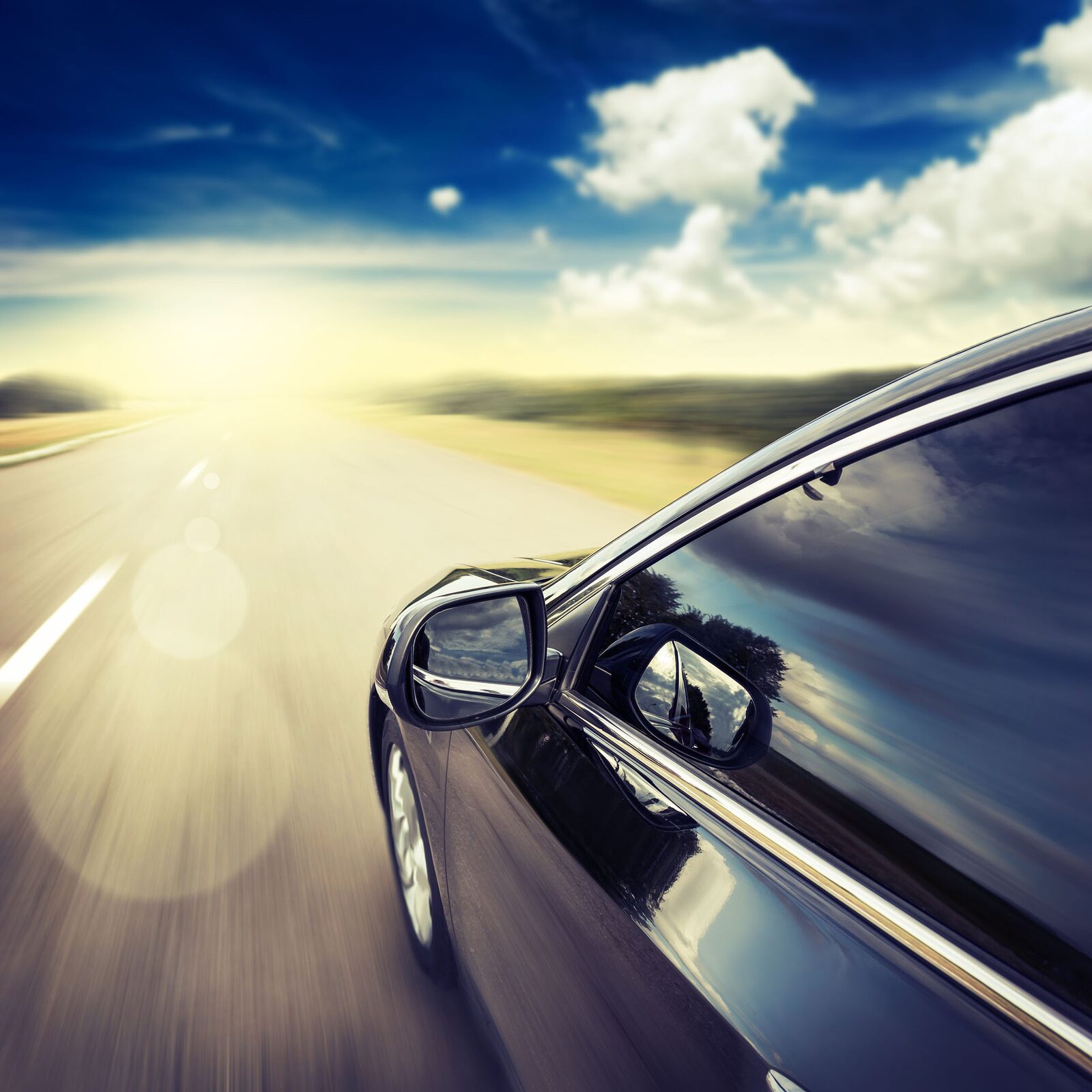 A vehicle on an open road at sunset — the journey auto insurance is built to protect