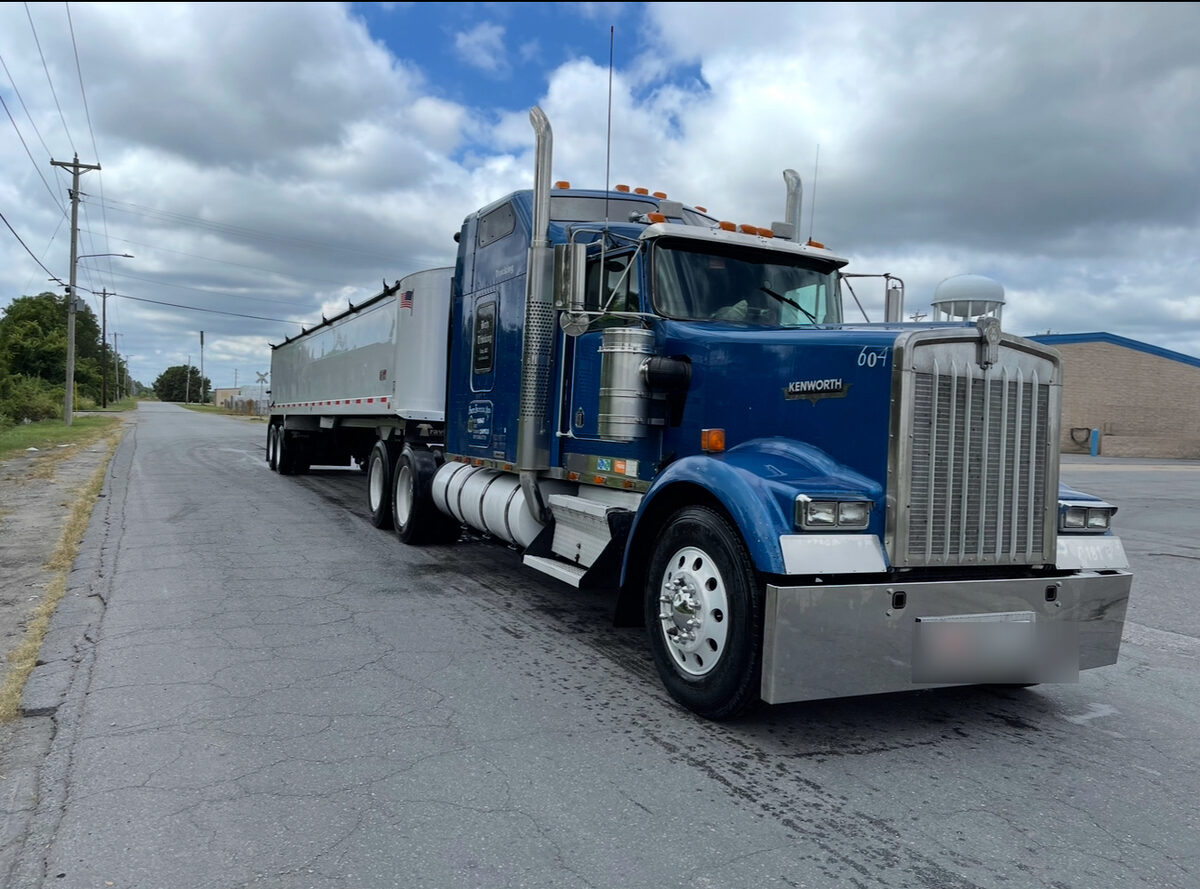 A classic 2000 Kenworth W900 — the kind of older truck many carriers decline to insure, but InsureToday24 will